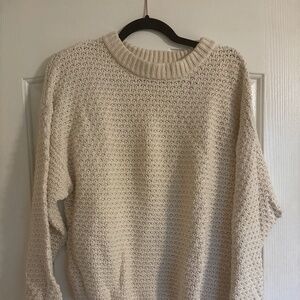 Cream cotton sweater.